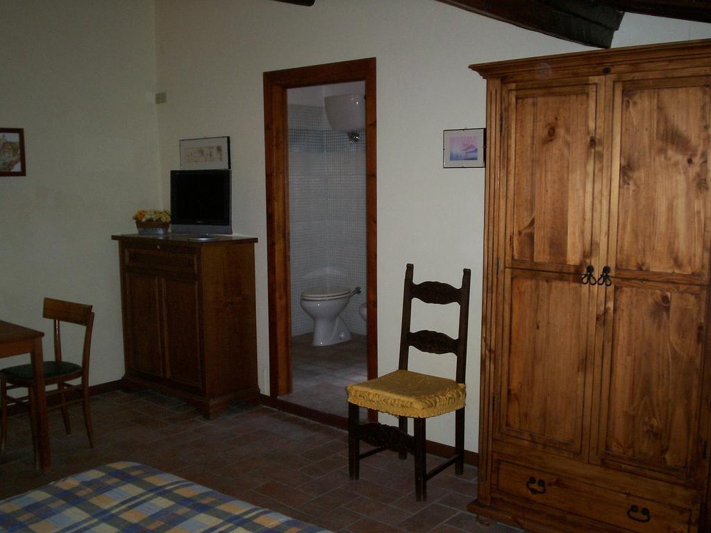 Podere Il Caggio Rooms Сан-Джиминьяно Номер фото